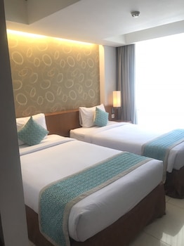 adhi jaya sunset hotel