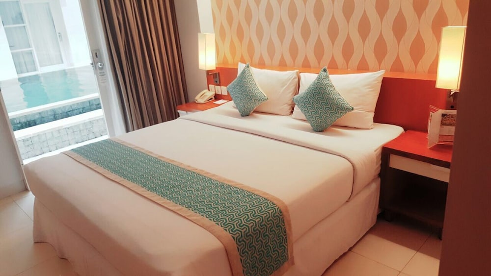 adhi jaya sunset hotel