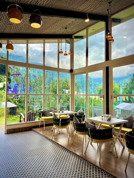 glass cabins and cafe by urban monk