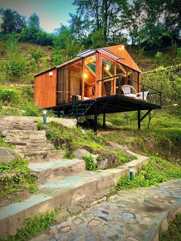 glass cabins and cafe by urban monk