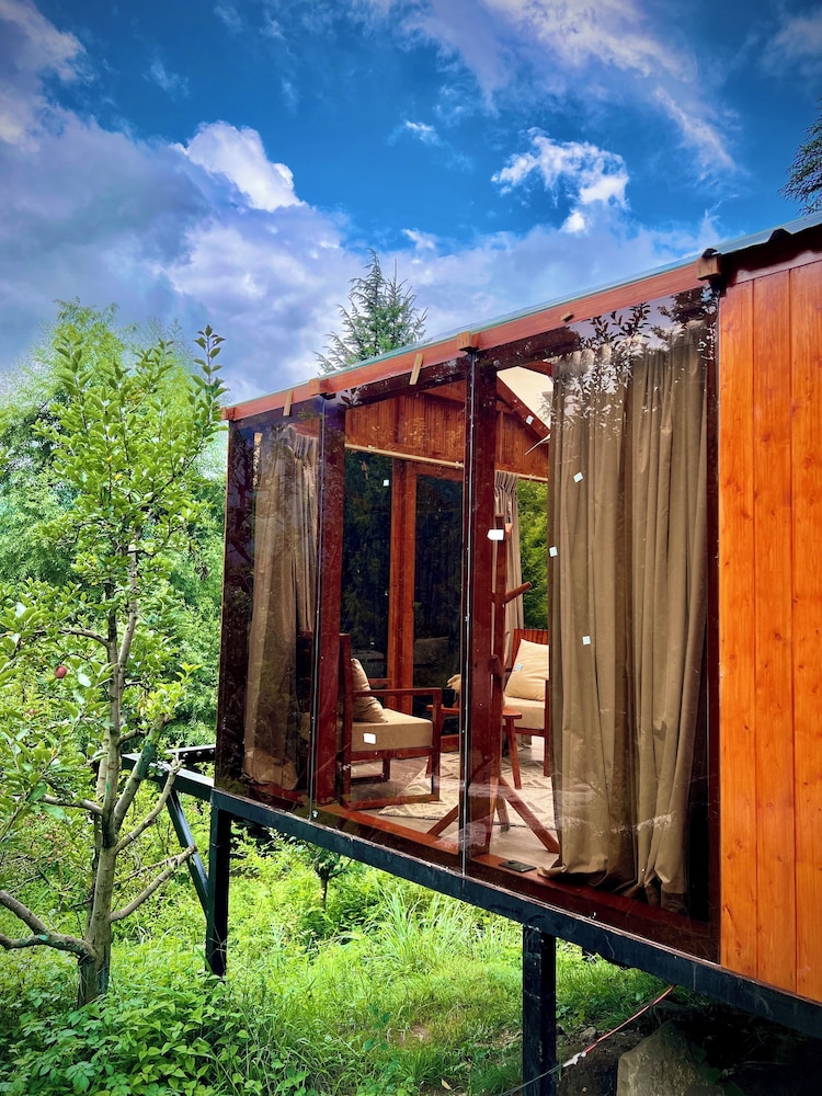 glass cabins and cafe by urban monk