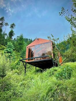 glass cabins and cafe by urban monk