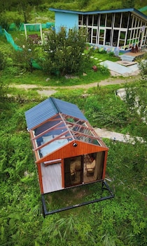 glass cabins and cafe by urban monk