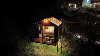 glass cabins and cafe by urban monk