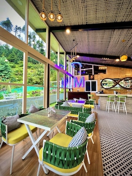 glass cabins and cafe by urban monk