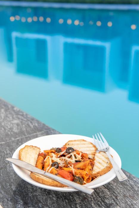 corbett tusker meadows by white flower