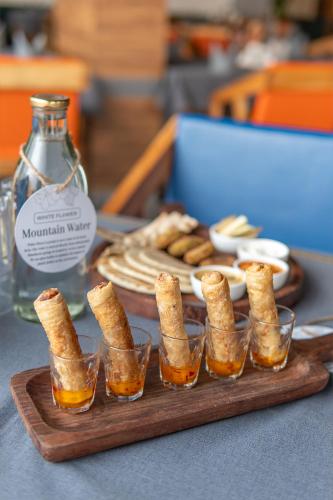 corbett tusker meadows by white flower