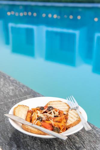 corbett tusker meadows by white flower