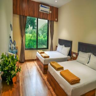 whispering peepul resort