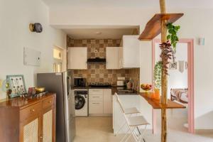 tisyastays pink door 1bhk apartment