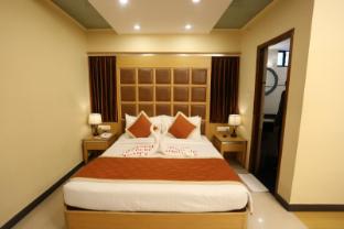 bisque magaji orchid near majestic railway station