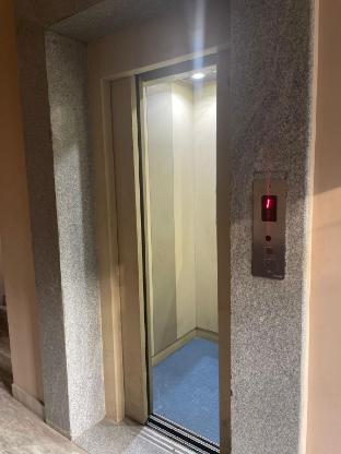 white house villa close to rock beach