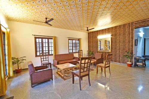 white house villa close to rock beach