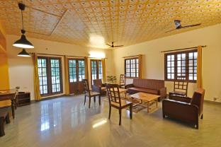 white house villa close to rock beach