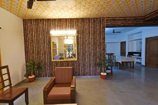 white house villa close to rock beach