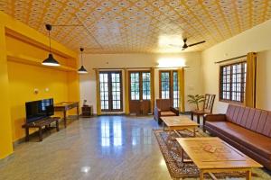 white house villa close to rock beach