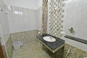 white house villa close to rock beach