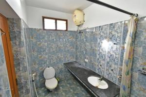 white house villa close to rock beach