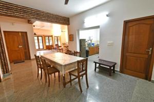 white house villa close to rock beach