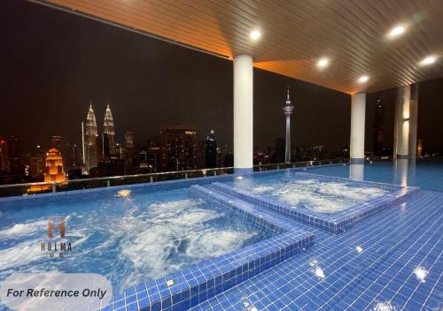the colony by klcc infinity pool studio netflix