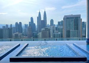 the colony by klcc infinity pool studio netflix