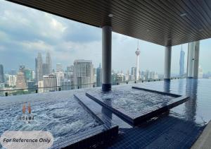 the colony by klcc infinity pool studio netflix