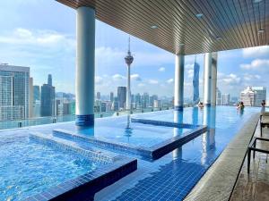the colony by klcc infinity pool studio netflix