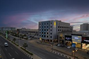 al qasr hotel suites corniche