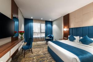al qasr hotel suites corniche