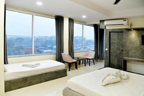 hotel m plaza dhulagar howrah