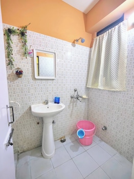 cozy guwahati apartment with city and mountain views