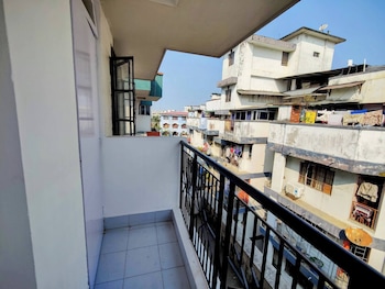 cozy guwahati apartment with city and mountain views