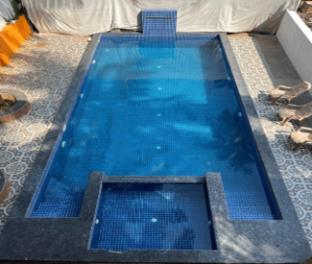 aura rooms and swimming pool calangute