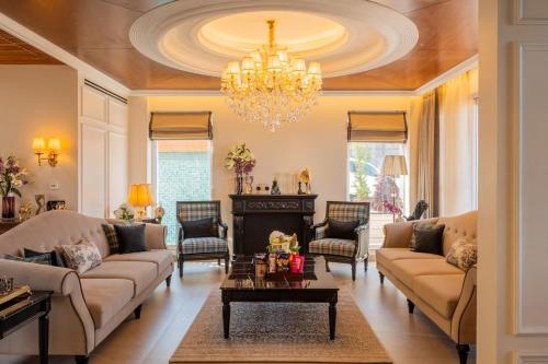 elivaas prive the royce daisy ultra luxe 4 bhk villa with pvt heated pool jacuzzi steam room and hill views