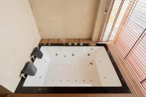 Elivaas Prive The Royce Daisy Ultra-Luxe 4 Bhk Villa With Pvt Heated Pool, Jacuzzi, Steam Room & Hill Views,,5 star