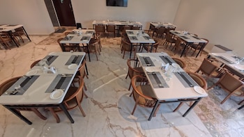 the orange hotel narsingi hyderabad