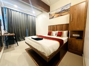 rio rooms calicut near mims