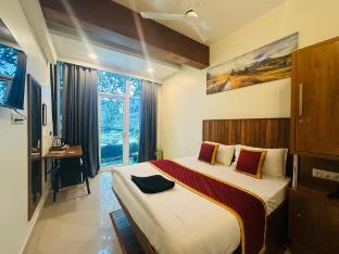 rio rooms calicut near mims