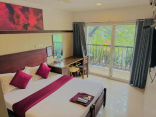 rio rooms calicut near mims