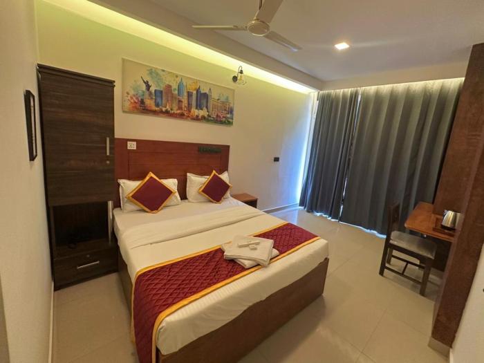 rio rooms calicut near mims