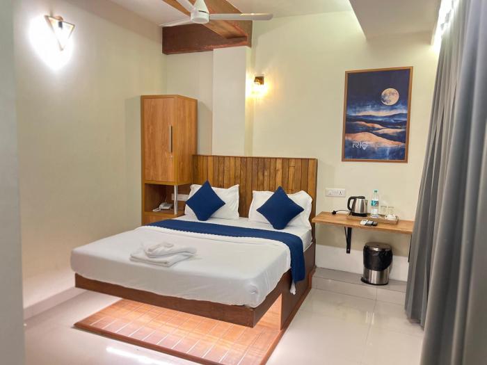 rio rooms calicut near mims