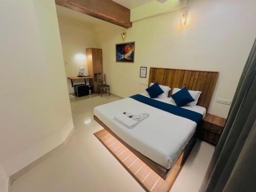 rio rooms calicut near mims