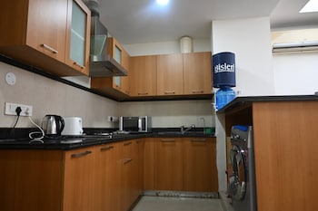 luxurious 1bhk apartment in gurgaon with shared pool and bbq area