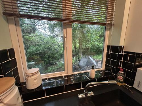 Cosy And Secluded Brook-Side Lodge,,2 star