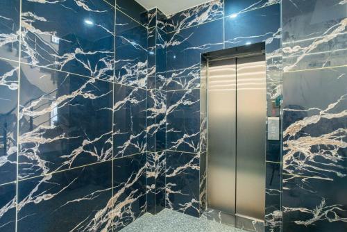 treebo royal grand sector 71