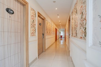 elegant stays with rooftop restro and hill view