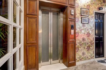 elegant stays with rooftop restro and hill view