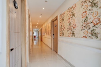 elegant stays with rooftop restro and hill view