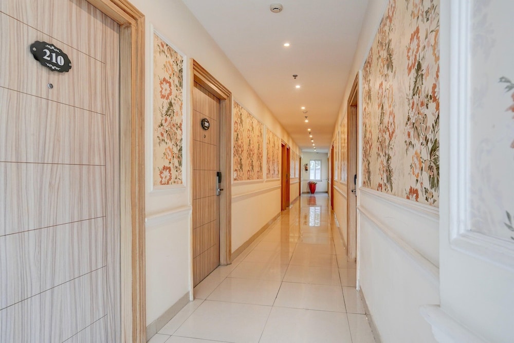 elegant stays with rooftop restro and hill view