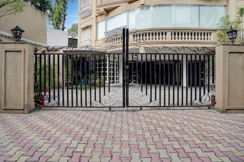 elegant stays with rooftop restro and hill view